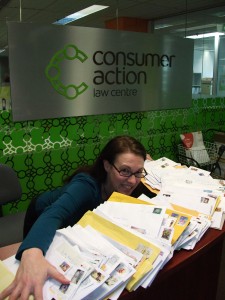 Consumer Action's office manager with all our sticker requests